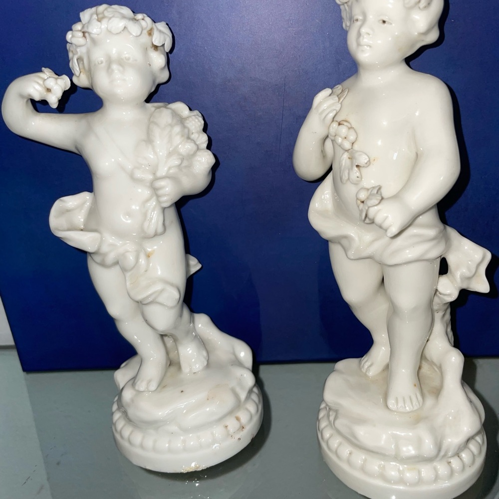 Pair of vintage French porcelain cherubs